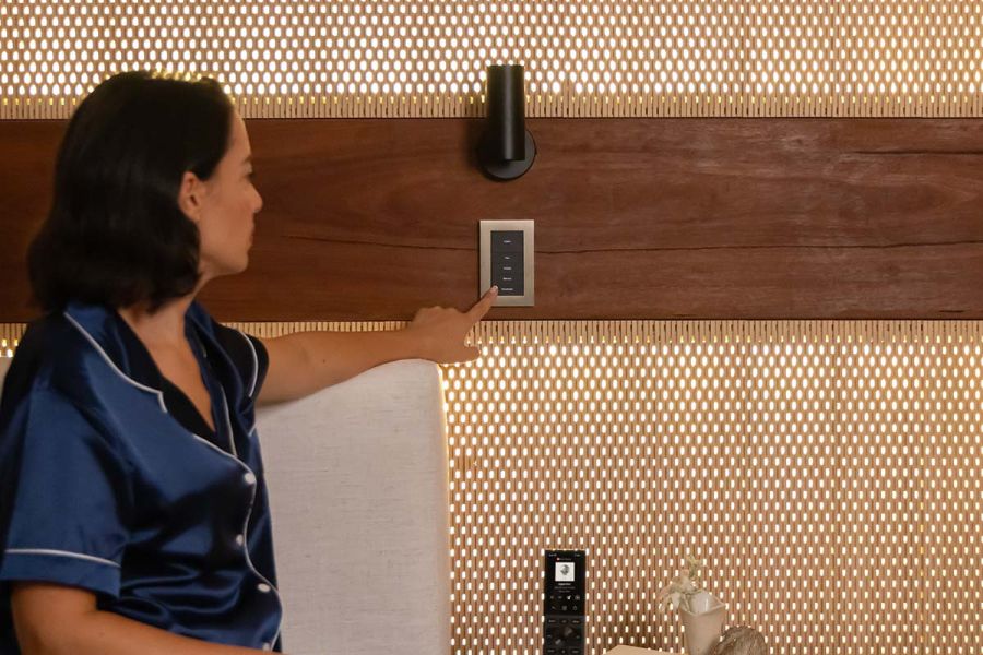 Amazon alexa sitting on table in front of wooden furniture