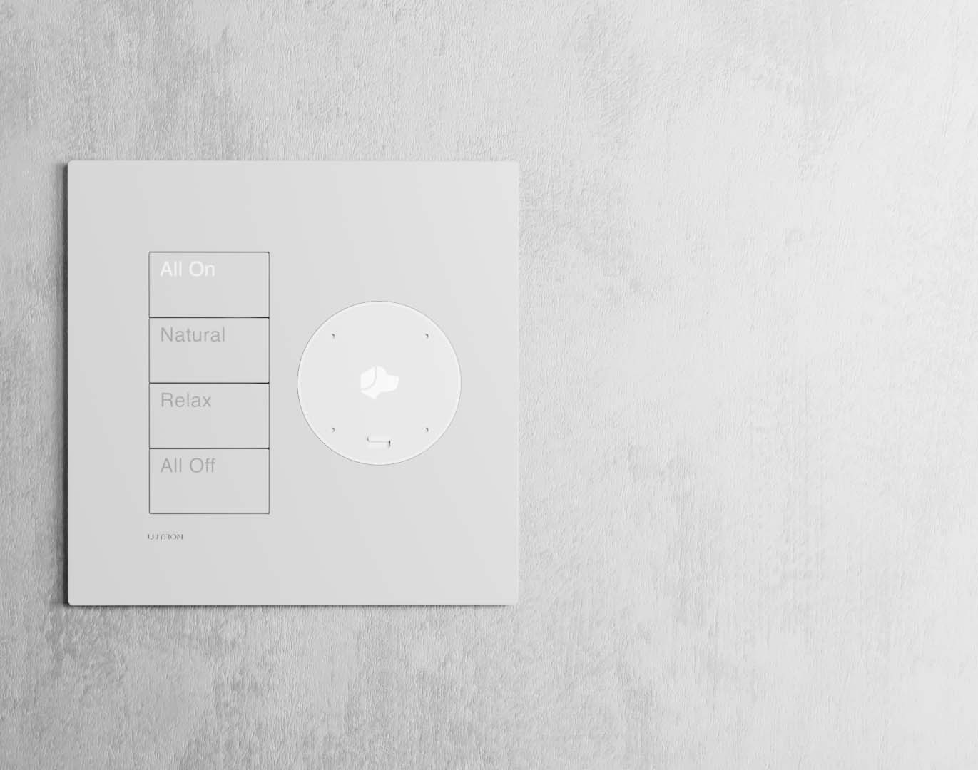 White wall keypad with labeled scene buttons and circular control