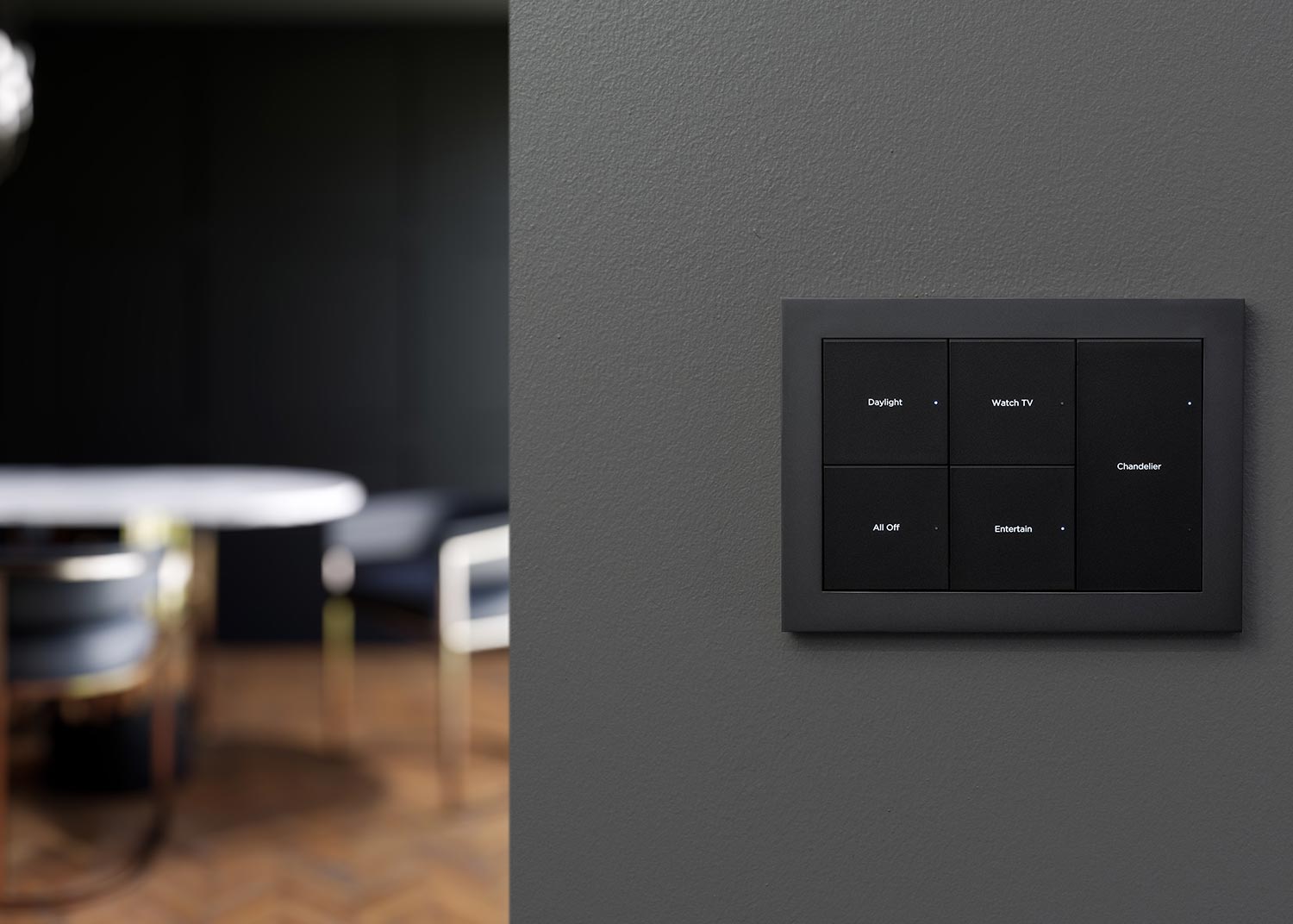 Modern black wall keypad with labeled buttons for home automation scenes