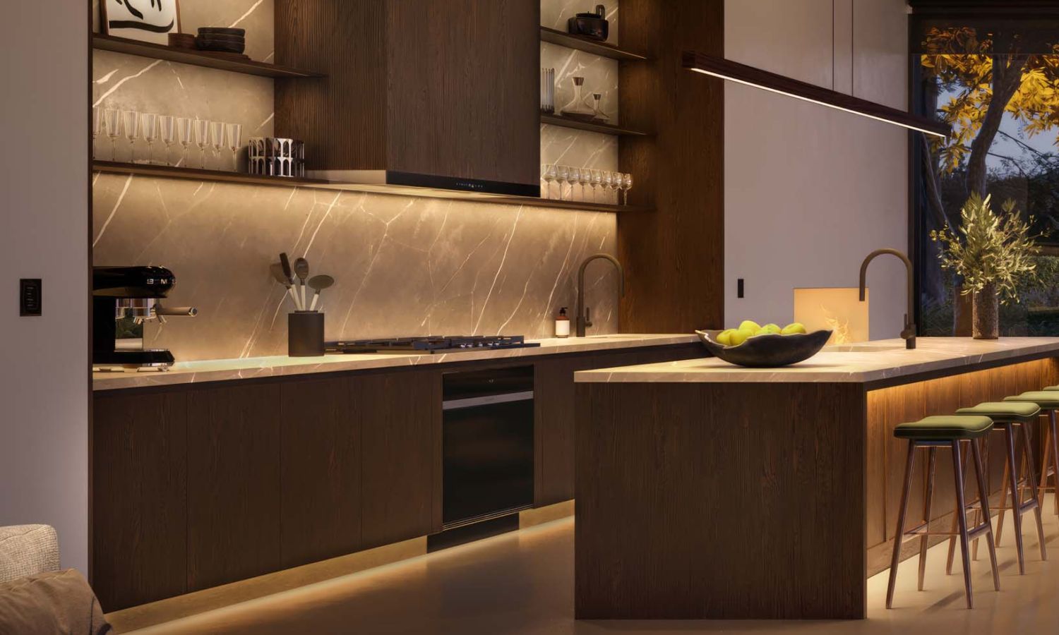 Modern kitchen with warm undercabinet lighting and illuminated island accents